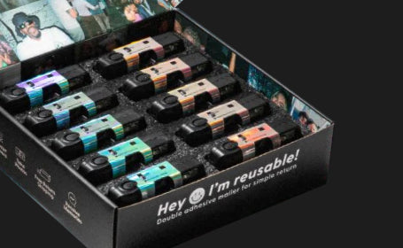 A Party Pack of holographic and matte white Strap cameras